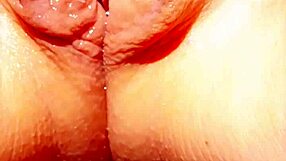 Watch this mature wife spread her huge wet pussy lips wide open!