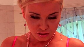 blonde milf plays with her smooth pussy in the jacuzzi