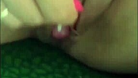 cute coed licks lollipop while fingering wet pussy on train