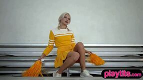 i can't stop staring at this petite blonde milf cheerleader's big ass on display