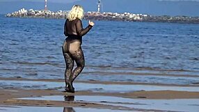 i love flashing my big tits and ass on the beach