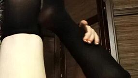 Petite girl teases in pantyhose and lingerie solo