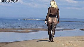 i love flashing my big tits and ass on the beach