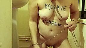 Humiliated Milf Slave Eats from Bowl with Buttplug in BDSM Play