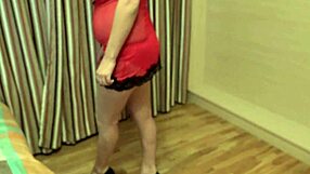 a busty milf shows off her curves undressing on webcam... sexy!