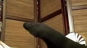 Petite girl teases in pantyhose and lingerie solo