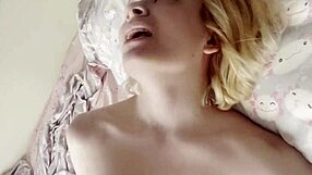 the cute blonde babe grabs her new dildo and teases her shaved pussy with long skinny legs