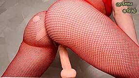 check out this hot milf in red fishnets riding dildo like a real cock slut