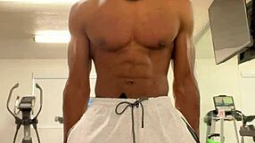 black bodybuilder works out neck and shoulders outdoors for college ladies