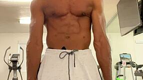 black bodybuilder works out neck and shoulders outdoors for college ladies