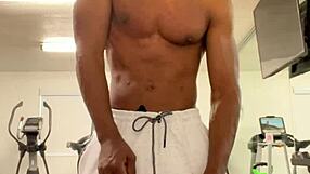 black bodybuilder works out neck and shoulders outdoors for college ladies