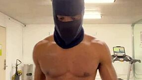 black bodybuilder works out neck and shoulders outdoors for college ladies