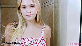 Gorgeous blonde teen steps into steamy shower