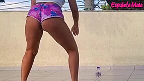 brunette hikes shorts into ass crack outdoors