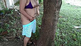 Horny Stepmom Fingers Ass And Rubs Pussy On Tree Alone!