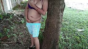 Horny Stepmom Fingers Ass And Rubs Pussy On Tree Alone!