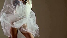 Blonde gymnast stretches flexibly through acrobatic gym poses