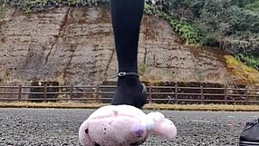 Japanese crossdresser crushes soft toys in fetish play revealing asian urges.