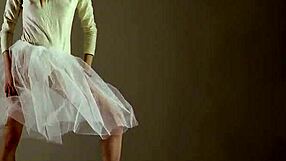 Blonde gymnast stretches flexibly through acrobatic gym poses