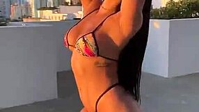 hot latina gym babe with big ass and tits strips outdoors for athletic lesbian play