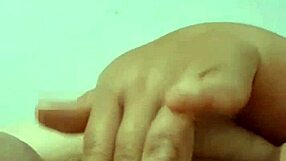 colombian abuela stuffs cucumber deep in mature pussy on bed