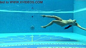 Does Hungarian Milf Sazan Tease Her Big Tits Underwater in Pool?