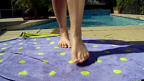 hey tasha reign fingers her wet pussy lips in bikini by the pool while tanning sensually