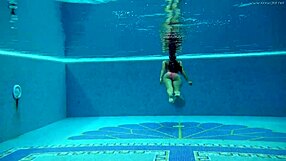 Does Hungarian Milf Sazan Tease Her Big Tits Underwater in Pool?