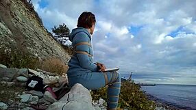 i'm sofi tied up against the sea reading my book in this hot pov view