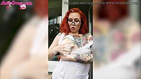 sexy redhead babe in wet t-shirt washes windows horny homemade