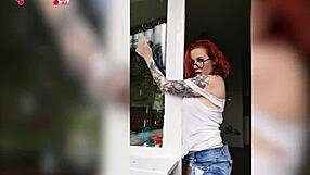 sexy redhead babe in wet t-shirt washes windows horny homemade