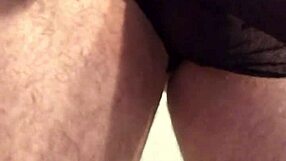 Black lingerie clings tight around her ass with buttplug teasing pussy closeup