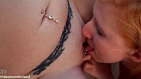 Blonde Val Halla and redhead Molly Mormon kiss lick pussies in bathtub girl on girl cunilingus orgasm tattoo natural tits