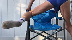 Skinny legs spread wide flashing monster cock bulge in tight blue briefs during deep stretches