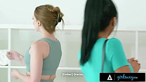 Ember Snow's big natural tits oiled as Laney Grey massages her to squirting orgasm!