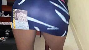that ebony teen ass looks fire peeking out under her tight skirt teasing hard