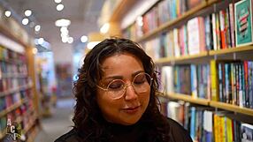 Peachie Garcia and Gibby the Clown play quirky librarians