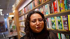 Peachie Garcia and Gibby the Clown play quirky librarians