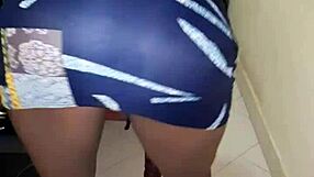 that ebony teen ass looks fire peeking out under her tight skirt teasing hard