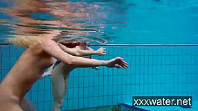 milana strips katrin bikini underwater at beach pool