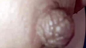 Close-Up View of Hard Nipple on Piano Keys During Intense Stimulation Session.