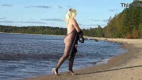 woman struts boldly in fishnet bodystocking and heels