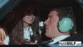 flight attendant's big fake tits bounce as she takes cock deep in cockpit