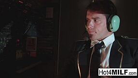 flight attendant's big fake tits bounce as she takes cock deep in cockpit