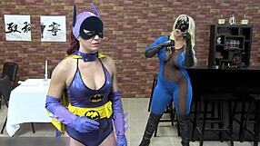 BATWOMAN SARAH BROOKE SUBMITS TO ALURA JENSON'S FEMDOM STRAPON DOMINATION!