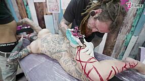 tattoo babe's big tits jiggle during intense anal gaping fuck