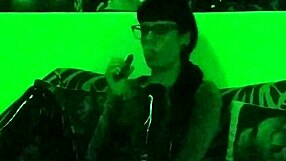 beth kinky goth domina lights up a cigarette in green light hd pt1