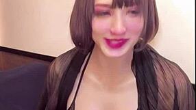 watching this sexy cat-ear ladyboy stroke live