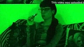 beth kinky goth domina lights up a cigarette in green light hd pt1