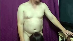 ebony employee kneels sucking boss cock before doggystyle pounding